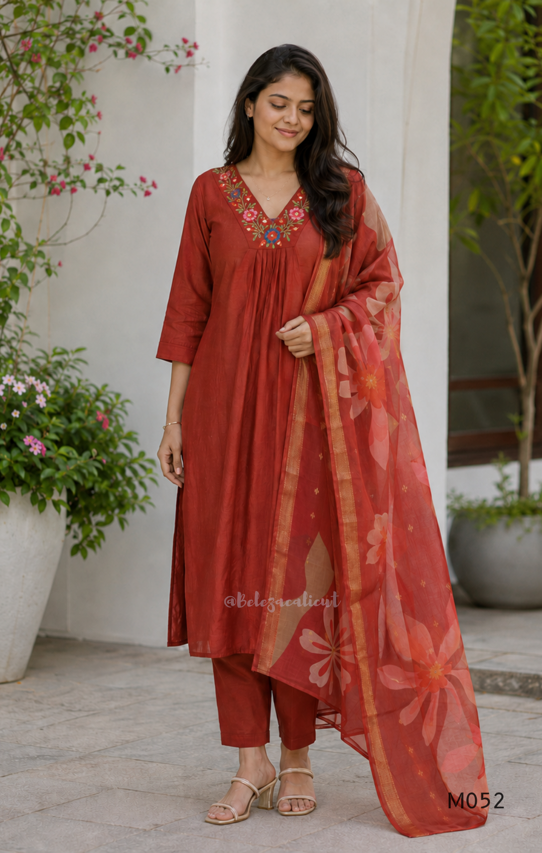 Silk blend 3-piece churidar set in teal, rani pink and rust shades with floral V-neck embroidery, printed dupatta and straight pant.