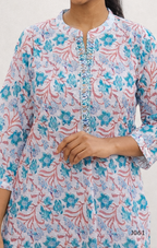 Floral patterned kurta worn by a person on a white background