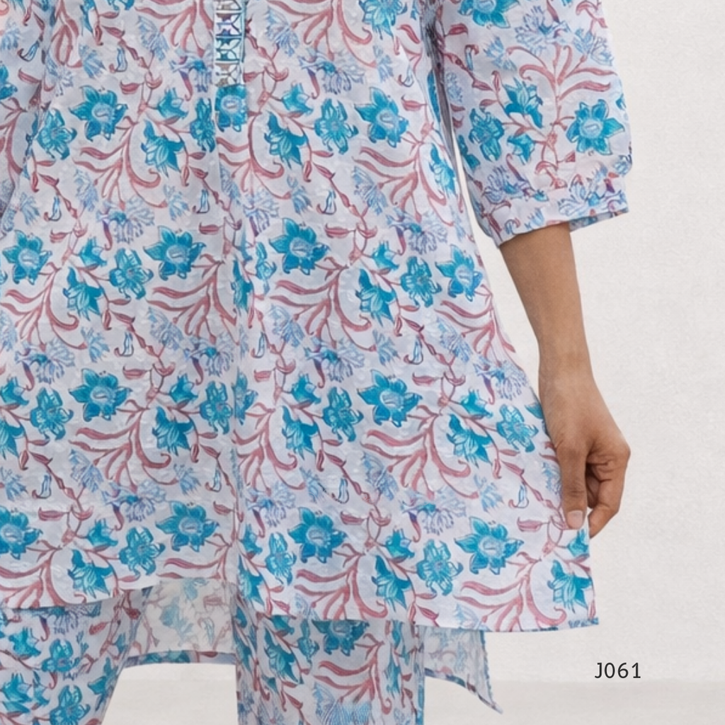 Floral patterned kurta with blue and pink colors on a white background