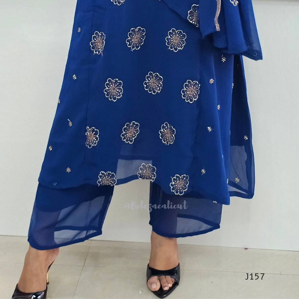 Blue embroidered outfit with a white background