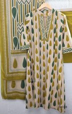 Beige cotton 3-piece churidar set with green and mustard drop motif, embroidered neckline, mustard bottom and printed dupatta.