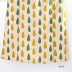 Beige cotton 3-piece churidar set with green and mustard drop motif, embroidered neckline, mustard bottom and printed dupatta.