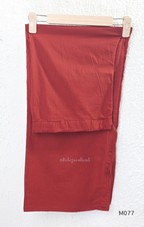 Beige cotton churidar set with red and black teardrop print, embroidered neckline, contrast red bottom and printed dupatta.