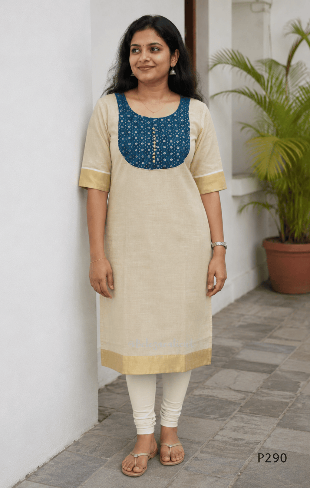 Beige cotton women’s ethnic top with teal embroidered yoke, short sleeves, and simple straight fit.