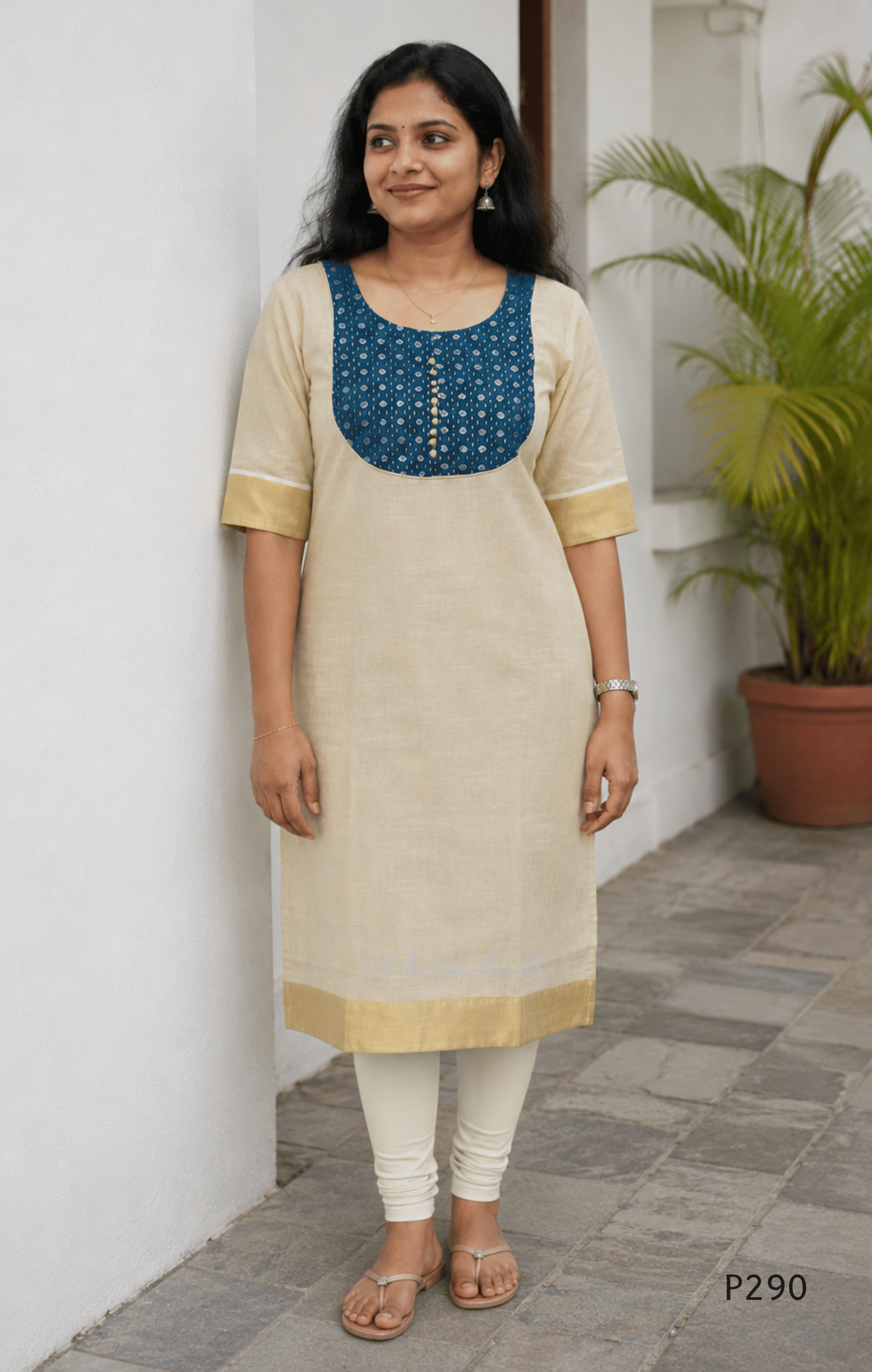 Beige cotton women’s ethnic top with teal embroidered yoke, short sleeves, and simple straight fit.