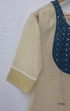 Beige cotton women’s ethnic top with teal embroidered yoke, short sleeves, and simple straight fit.