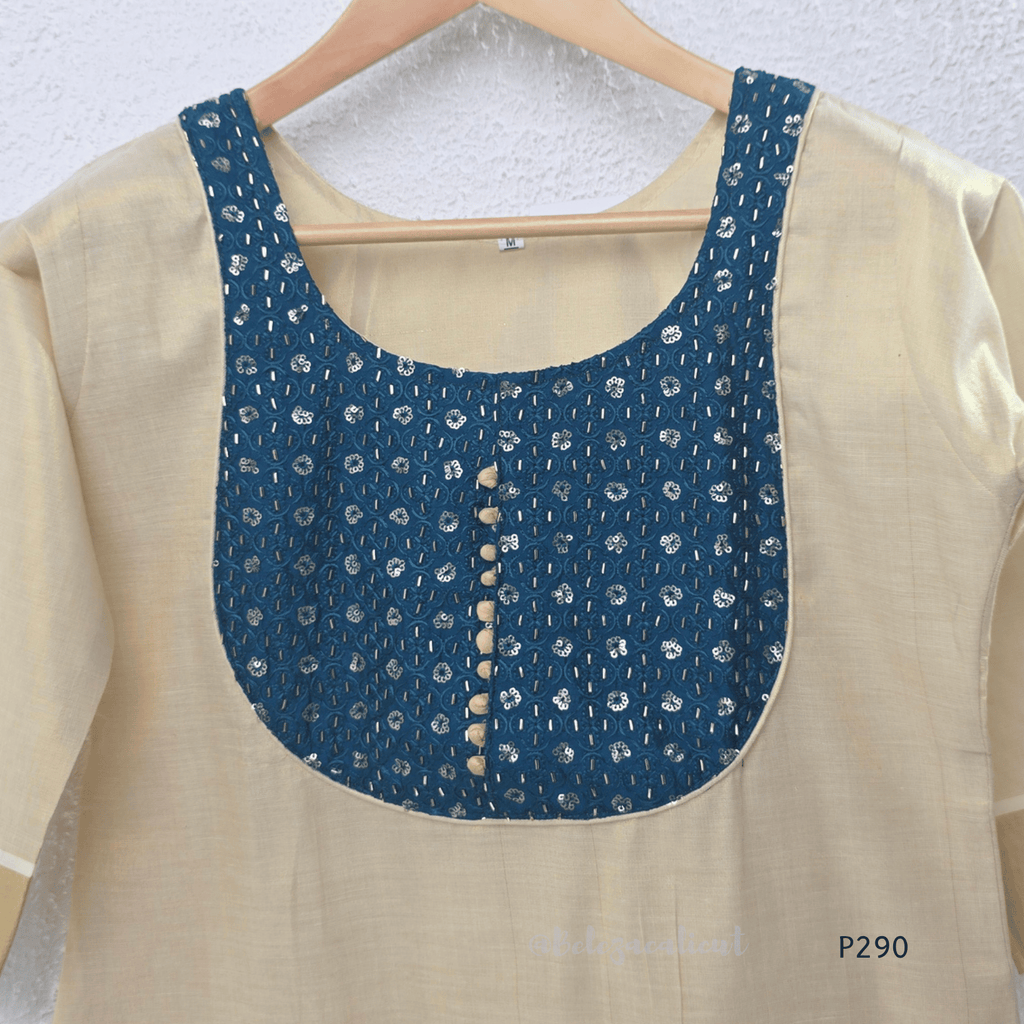 Beige cotton women’s ethnic top with teal embroidered yoke, short sleeves, and simple straight fit.