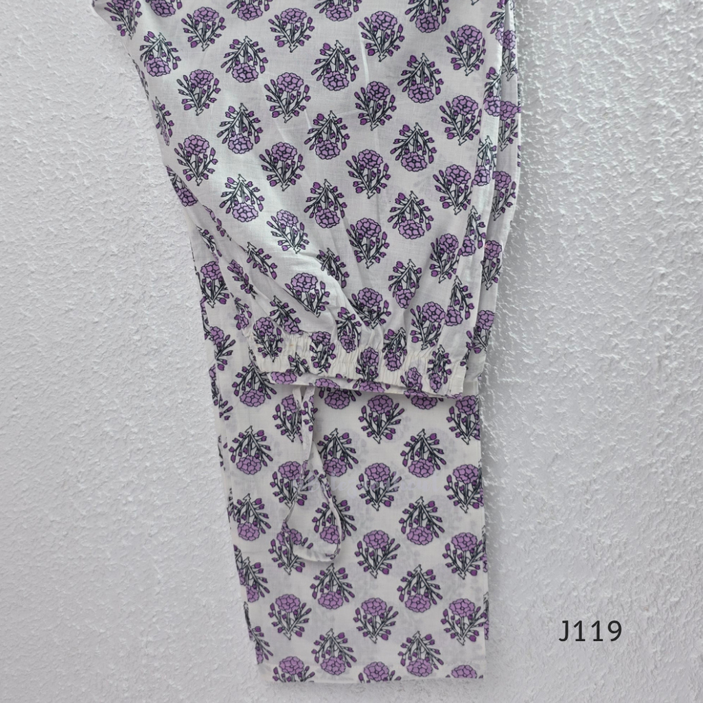 Beige mustard cotton 3-piece churidar set with lavender floral block print, gold V-neckline detail, ivory dupatta and matching printed bottom.