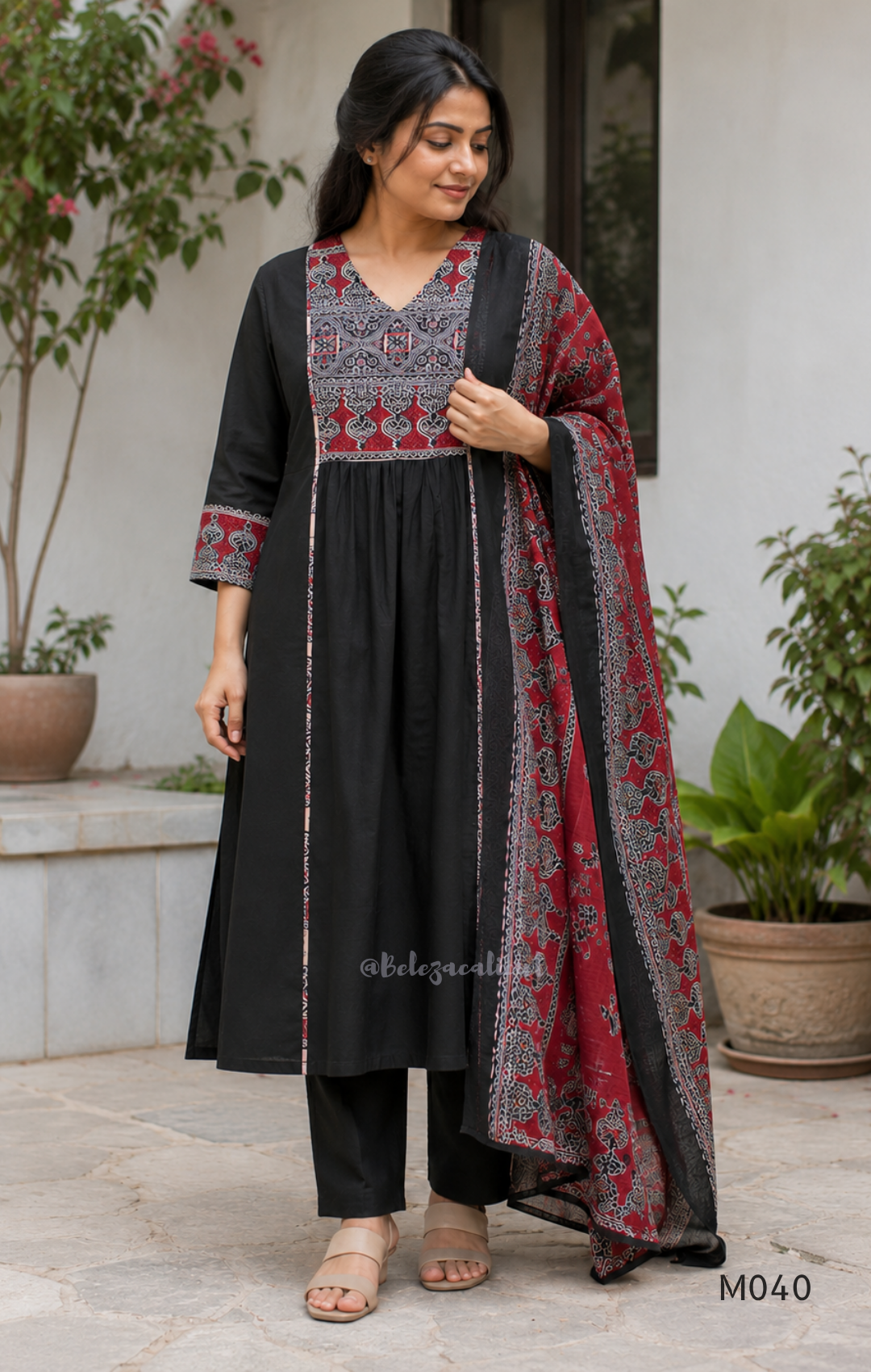 Black cotton 3-piece churidar set with red Ajrakh-style printed yoke, matching printed dupatta, and plain black pant.