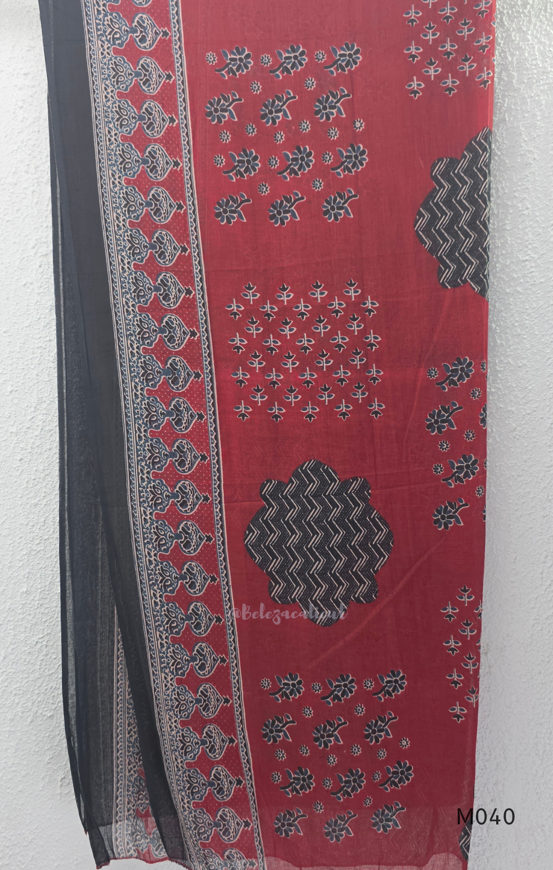 Black cotton 3-piece churidar set with red Ajrakh-style printed yoke, matching printed dupatta, and plain black pant.