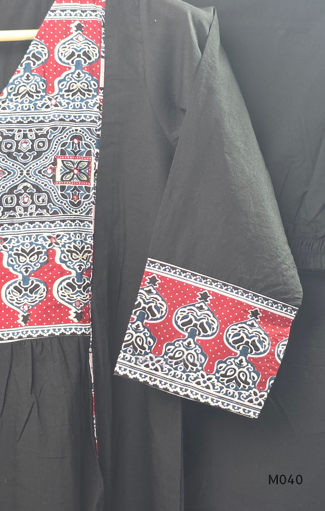 Black cotton 3-piece churidar set with red Ajrakh-style printed yoke, matching printed dupatta, and plain black pant.
