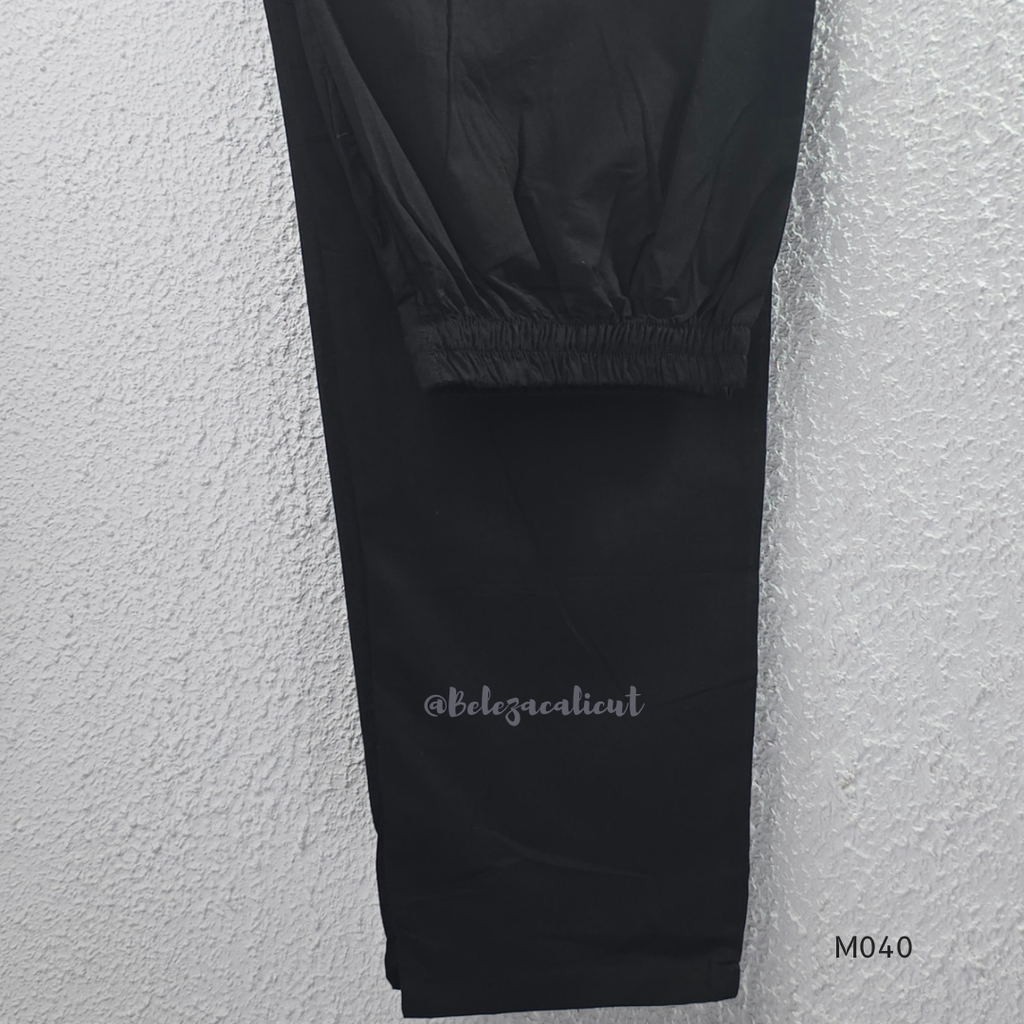 Black cotton 3-piece churidar set with red Ajrakh-style printed yoke, matching printed dupatta, and plain black pant.
