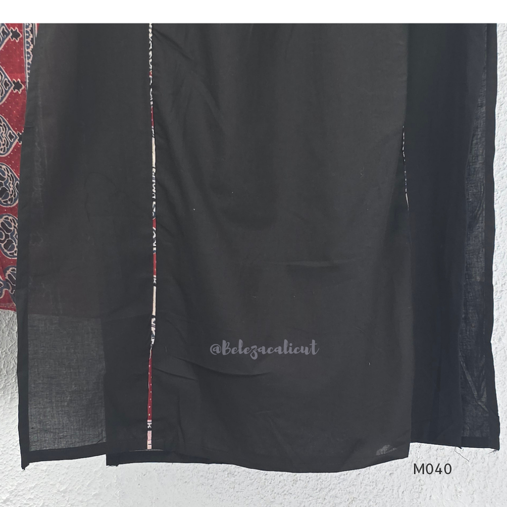 Black cotton 3-piece churidar set with red Ajrakh-style printed yoke, matching printed dupatta, and plain black pant.