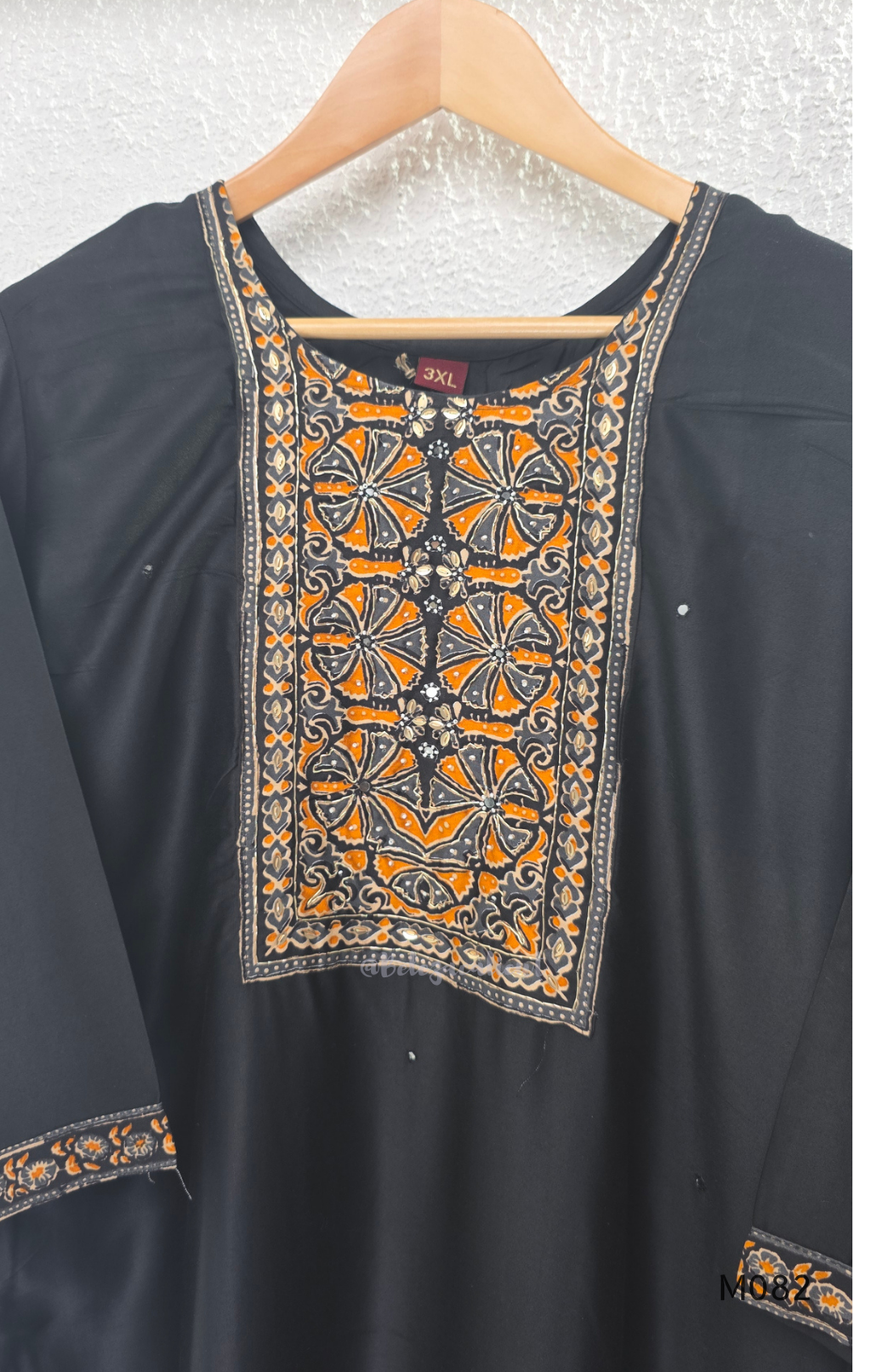 Black Gajji silk plus size churidar set with embroidered yoke, sleeve border, matching black bottom and contrast red printed dupatta.