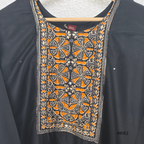 Black Gajji silk plus size churidar set with embroidered yoke, sleeve border, matching black bottom and contrast red printed dupatta.