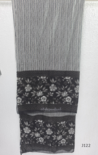 Black Jaipur cotton 3-piece churidar set with grey-white floral print, V-neck detail, printed dupatta and striped matching bottom.