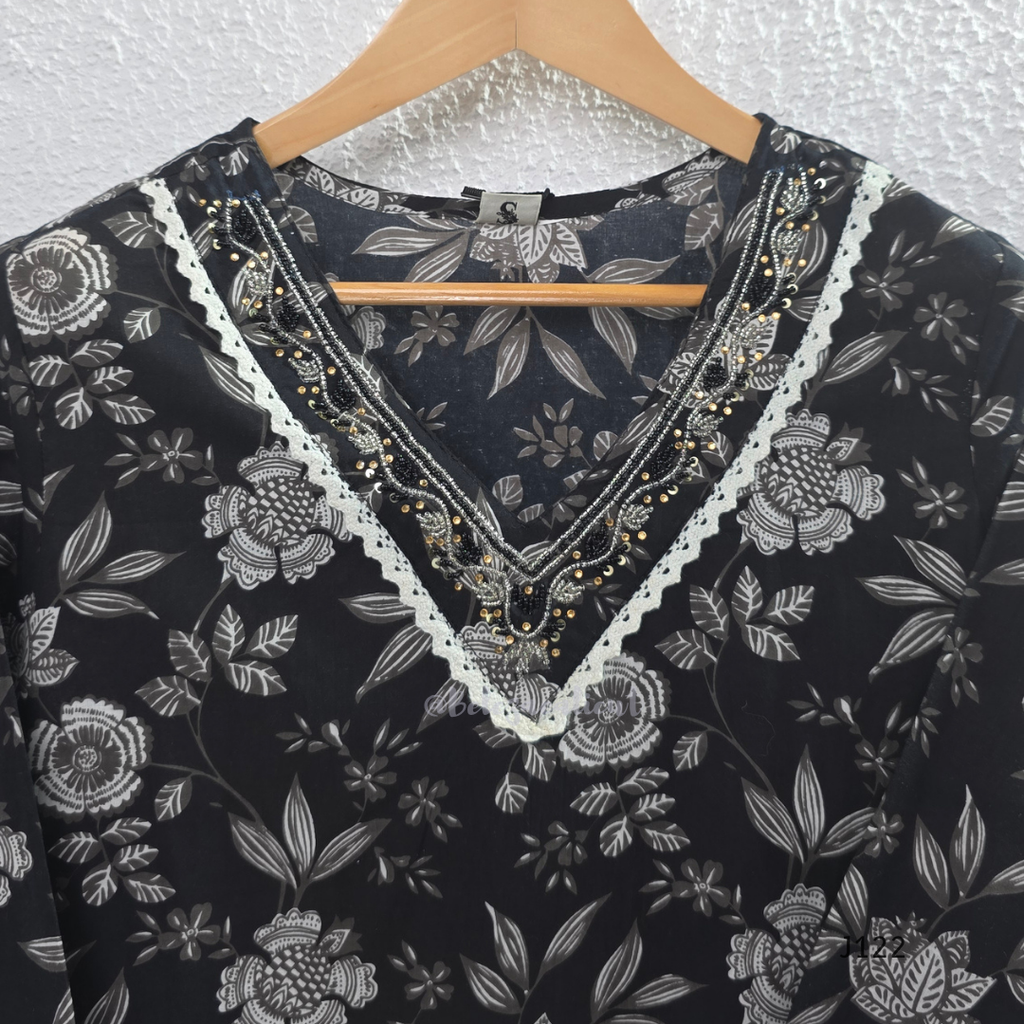 Black Jaipur cotton 3-piece churidar set with grey-white floral print, V-neck detail, printed dupatta and striped matching bottom.