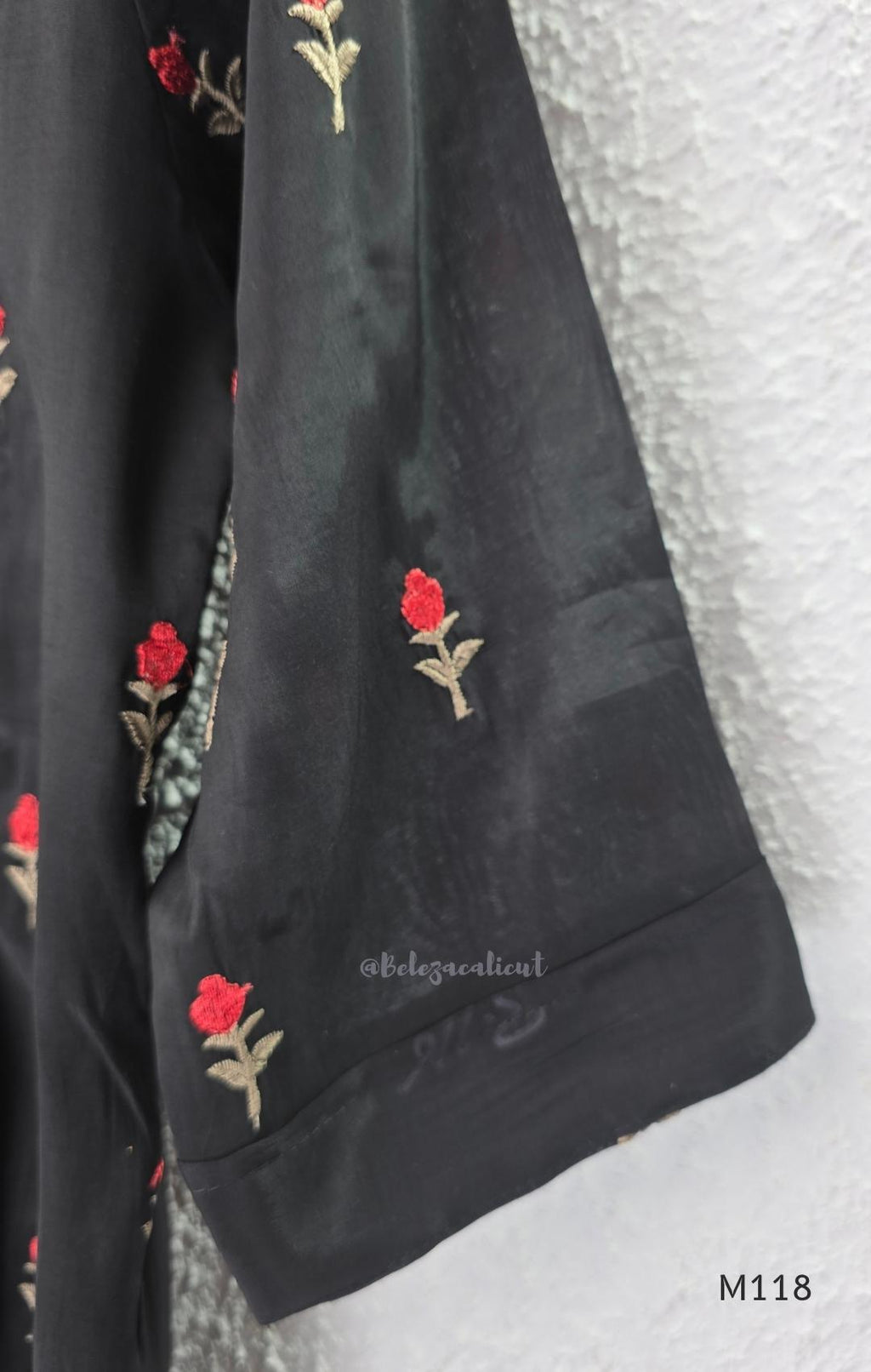 Black Mul Chanderi churidar set with red rose embroidery, straight pant and embroidered dupatta.