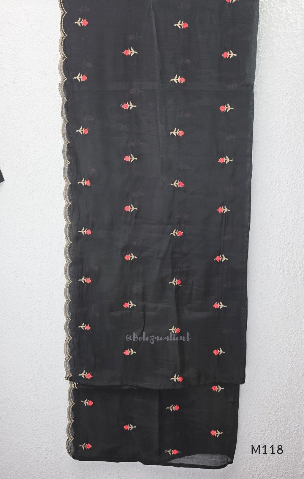 Black Mul Chanderi churidar set with red rose embroidery, straight pant and embroidered dupatta.