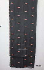 Black Mul Chanderi churidar set with red rose embroidery, straight pant and embroidered dupatta.