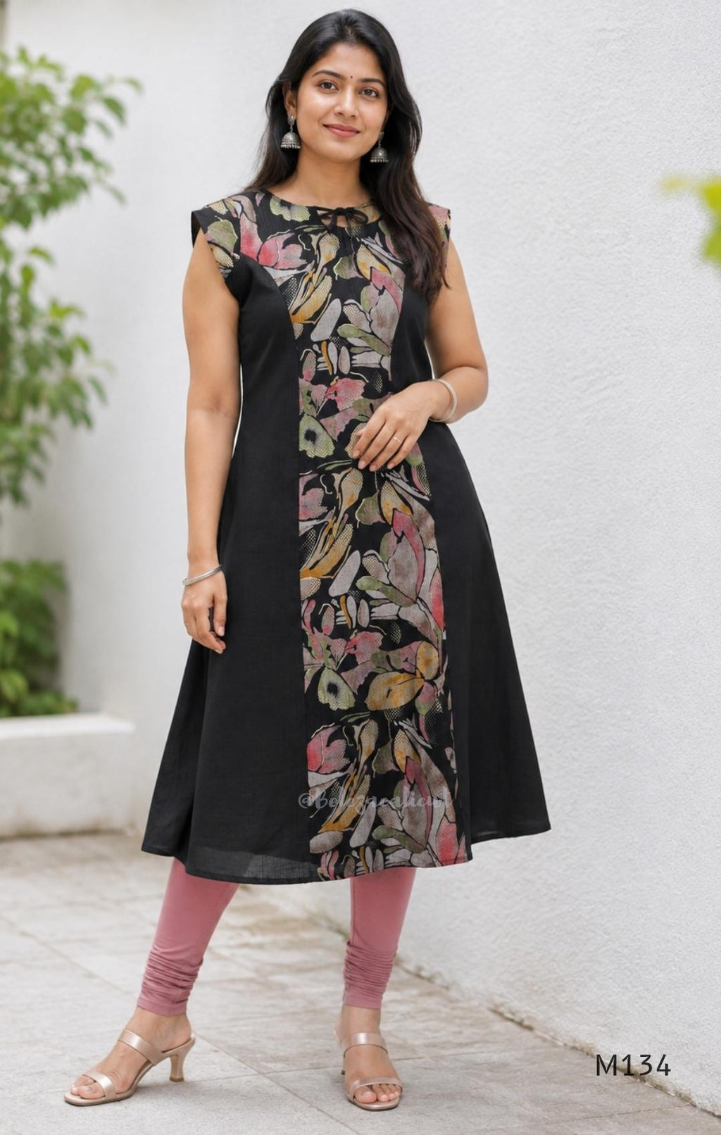 Black silk blend A-line long kurta with muted multicolour abstract floral centre panel and plain black side panels.