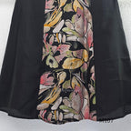 Black silk blend A-line long kurta with muted multicolour abstract floral centre panel and plain black side panels.