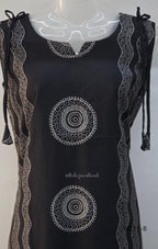 Black Vertigan silk printed co-ord set with straight mid-calf top and matching straight pants.