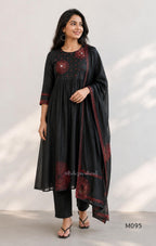 Black and teal blue Mul Chanderi 3-piece churidar sets with red circular embroidery and coordinated dupattas.