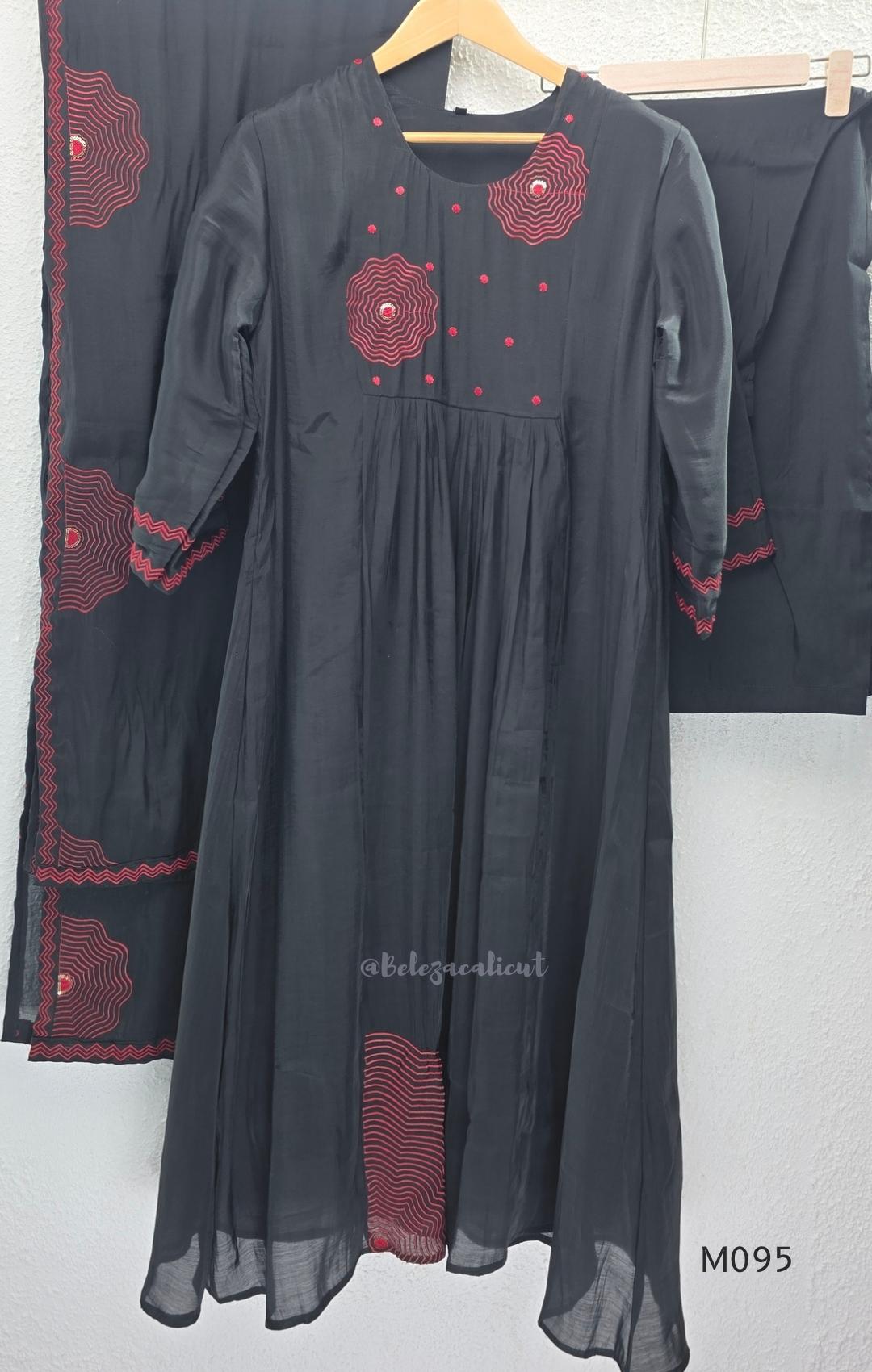 Black and teal blue Mul Chanderi 3-piece churidar sets with red circular embroidery and coordinated dupattas.