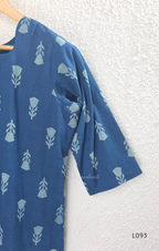 Blue cotton women’s top with light leaf print, notch neckline, elbow-length sleeves, and straight everyday fit.