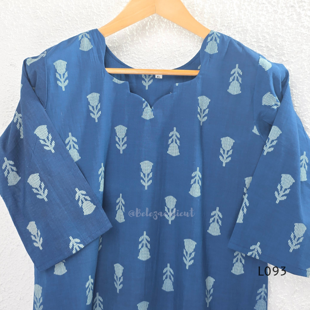 Blue cotton women’s top with light leaf print, notch neckline, elbow-length sleeves, and straight everyday fit.