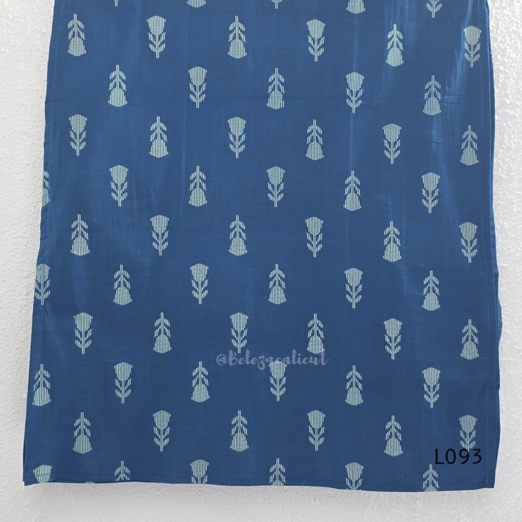 Blue cotton women’s top with light leaf print, notch neckline, elbow-length sleeves, and straight everyday fit.