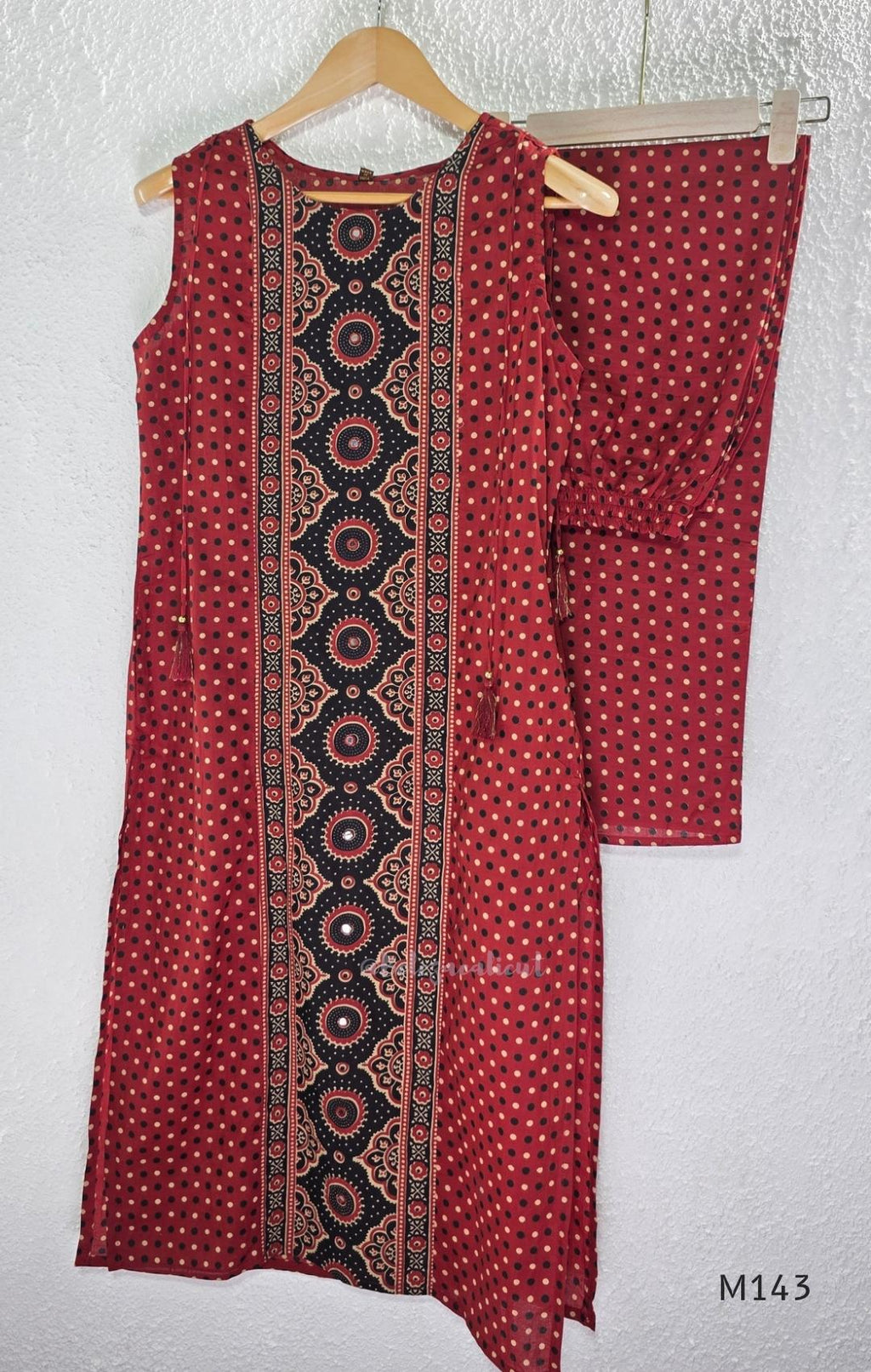 Brick red cotton top-and-bottom coord set with dotted print and black mirror-detail front panel.