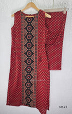 Brick red cotton top-and-bottom coord set with dotted print and black mirror-detail front panel.