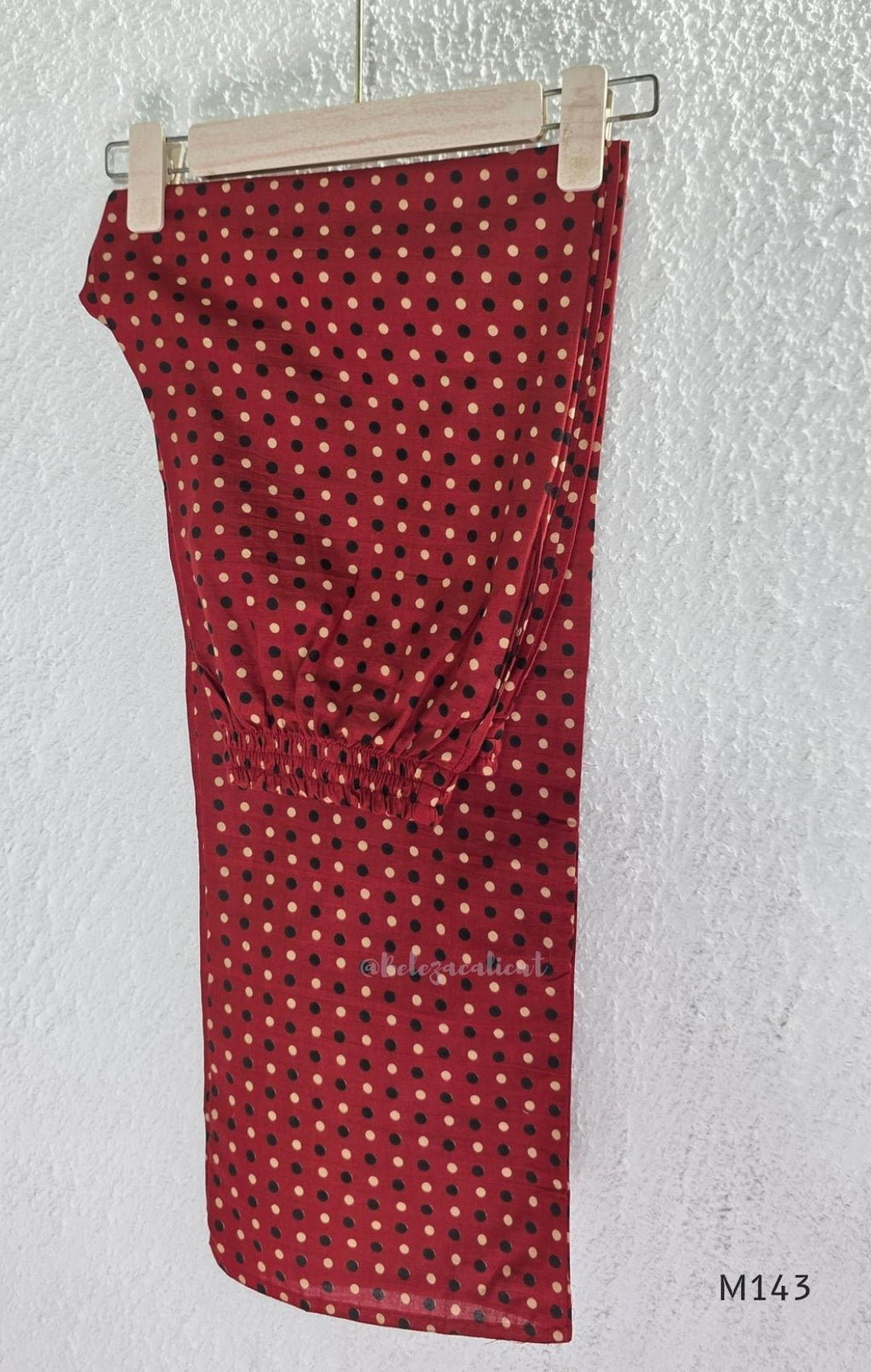 Brick red cotton top-and-bottom coord set with dotted print and black mirror-detail front panel.