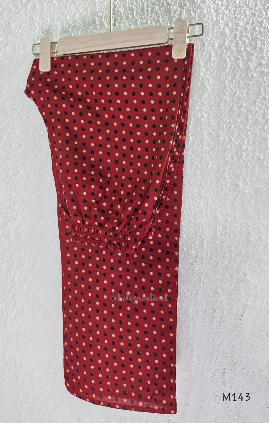 Brick red cotton top-and-bottom coord set with dotted print and black mirror-detail front panel.