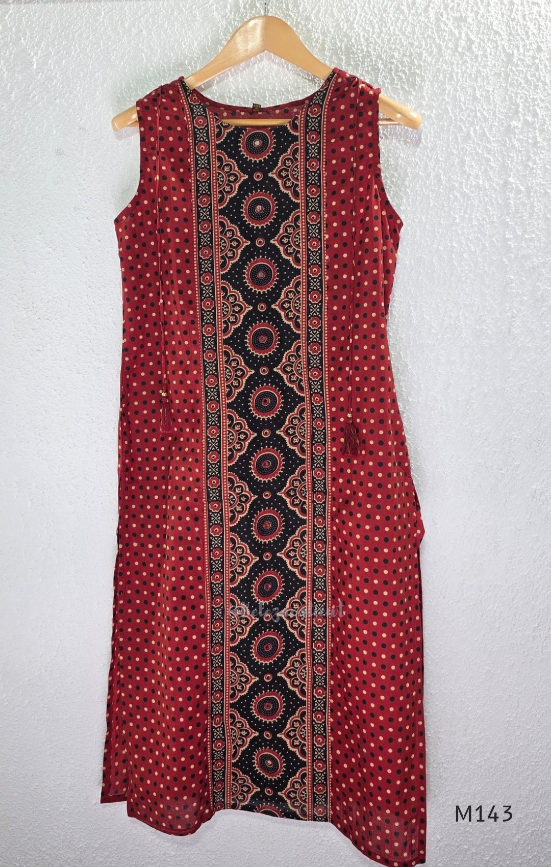 Brick red cotton top-and-bottom coord set with dotted print and black mirror-detail front panel.