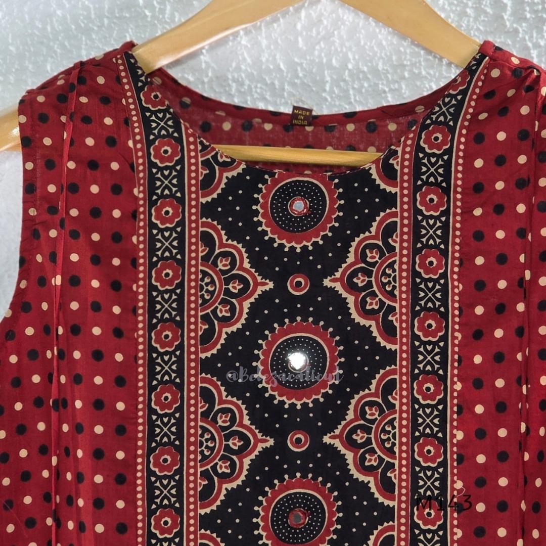 Brick red cotton top-and-bottom coord set with dotted print and black mirror-detail front panel.