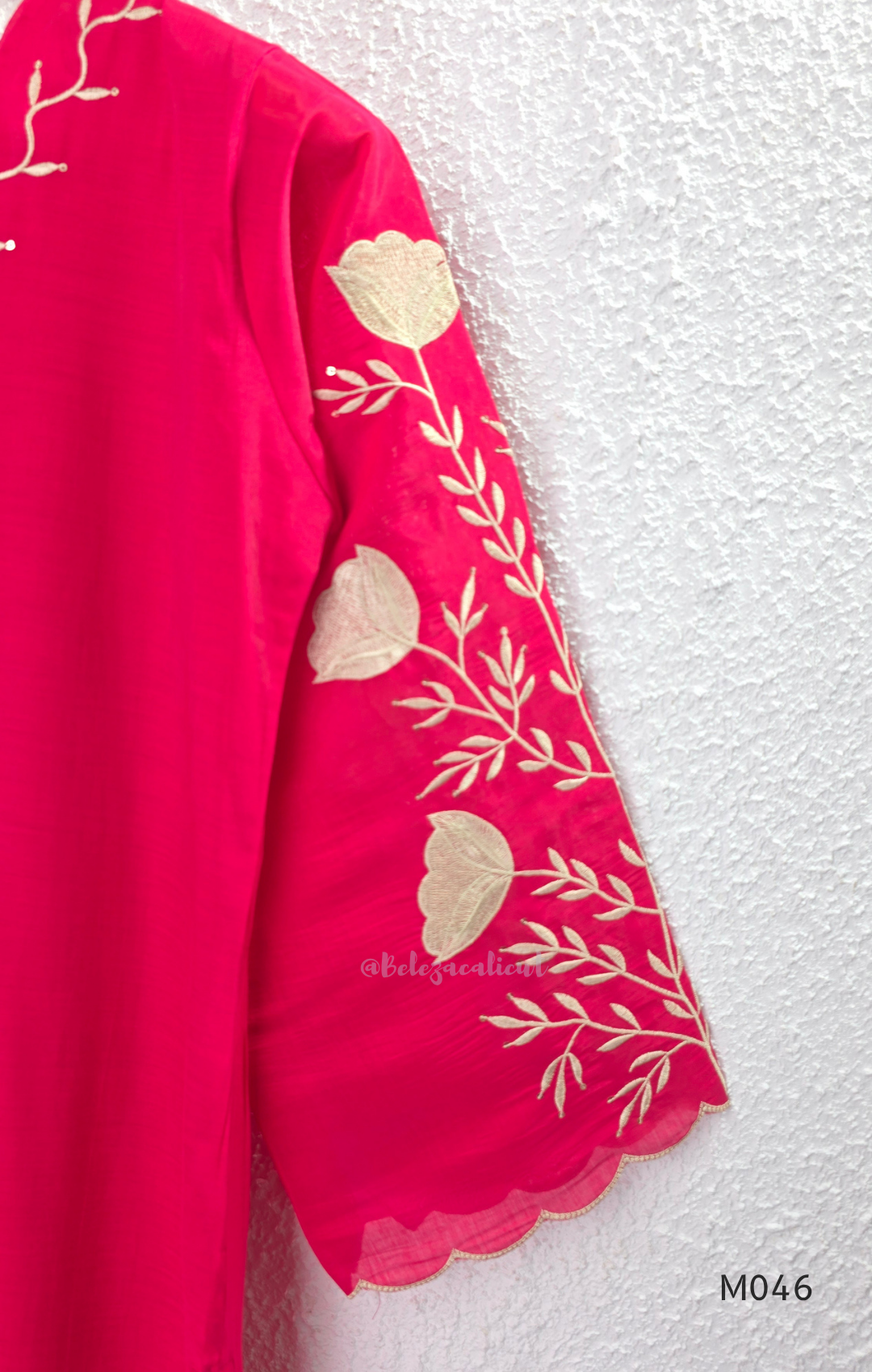 Bright rani red mul chanderi 3-piece churidar set with beige floral embroidery, scallop dupatta border and relaxed fit.
