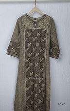 Brown and beige cotton churidar set with geometric block print kurti, matching bottom and printed dupatta at Beleza Calicut.