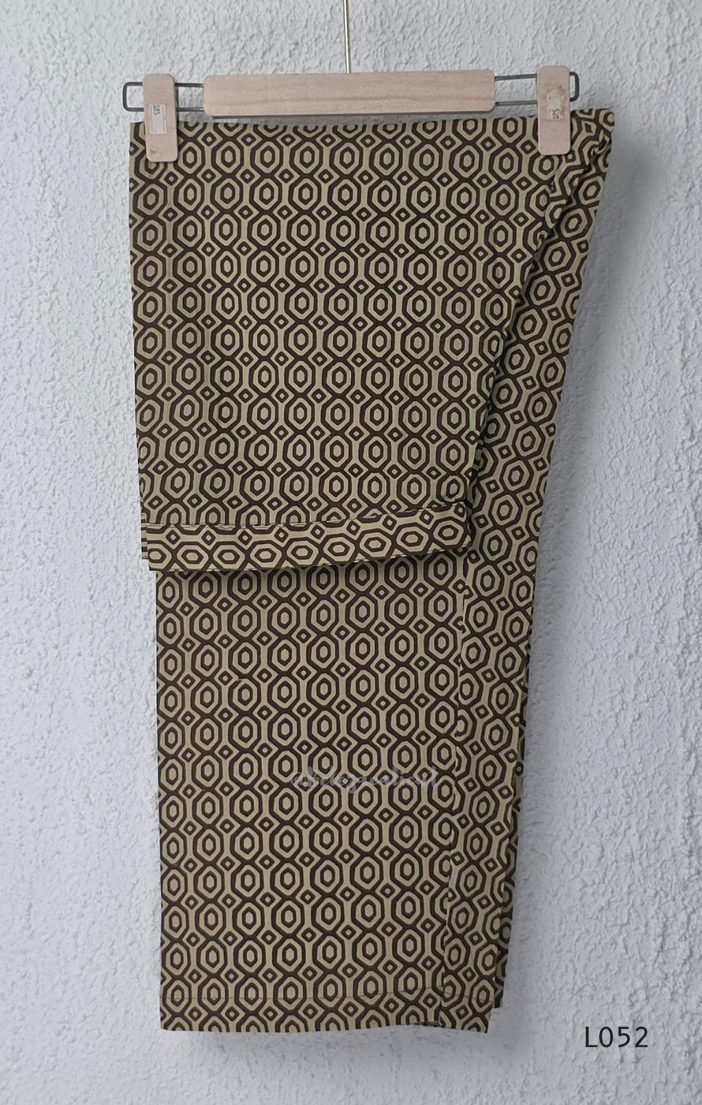 Brown and beige cotton churidar set with geometric block print kurti, matching bottom and printed dupatta at Beleza Calicut.