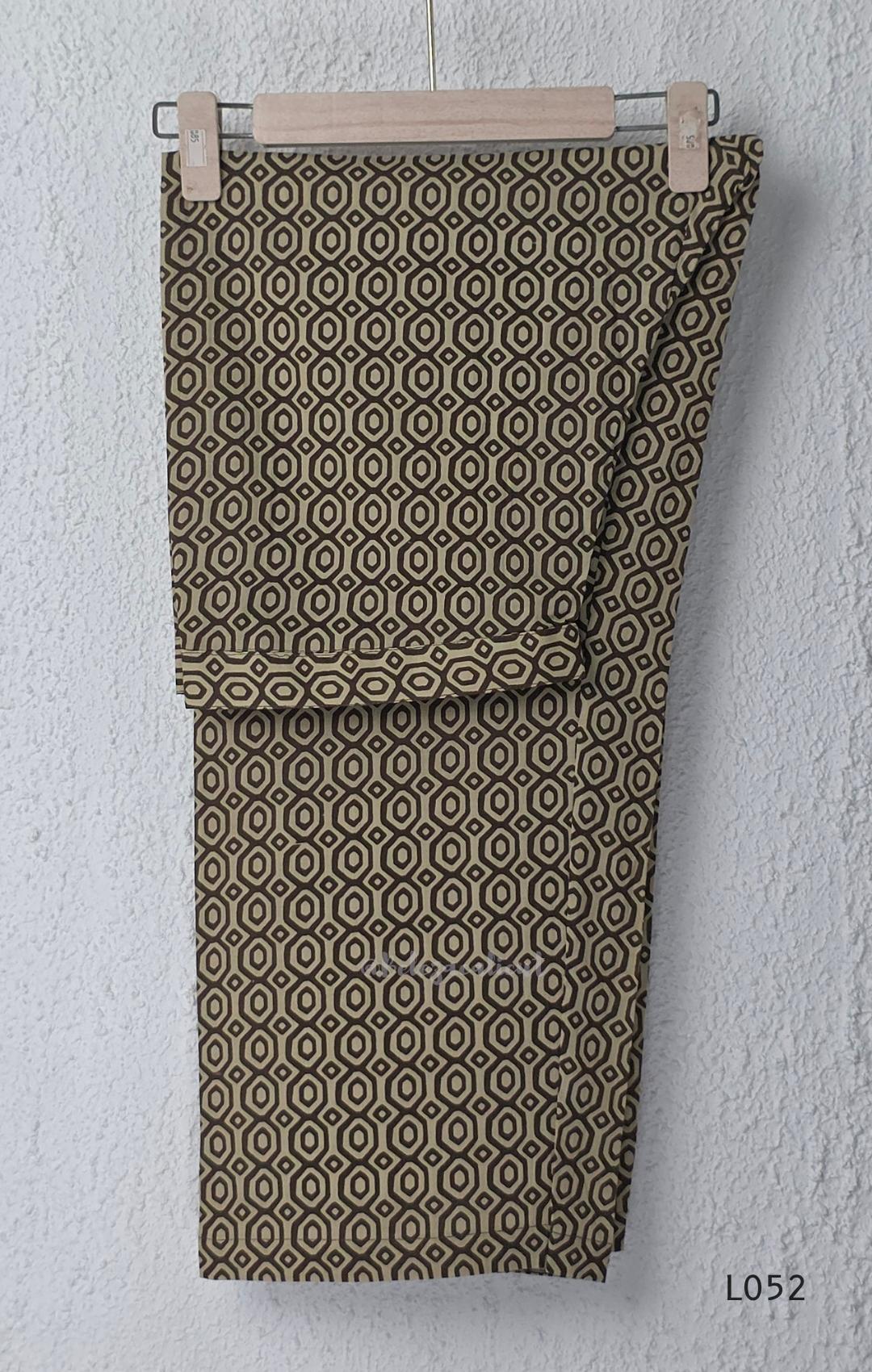 Brown and beige cotton churidar set with geometric block print kurti, matching bottom and printed dupatta at Beleza Calicut.