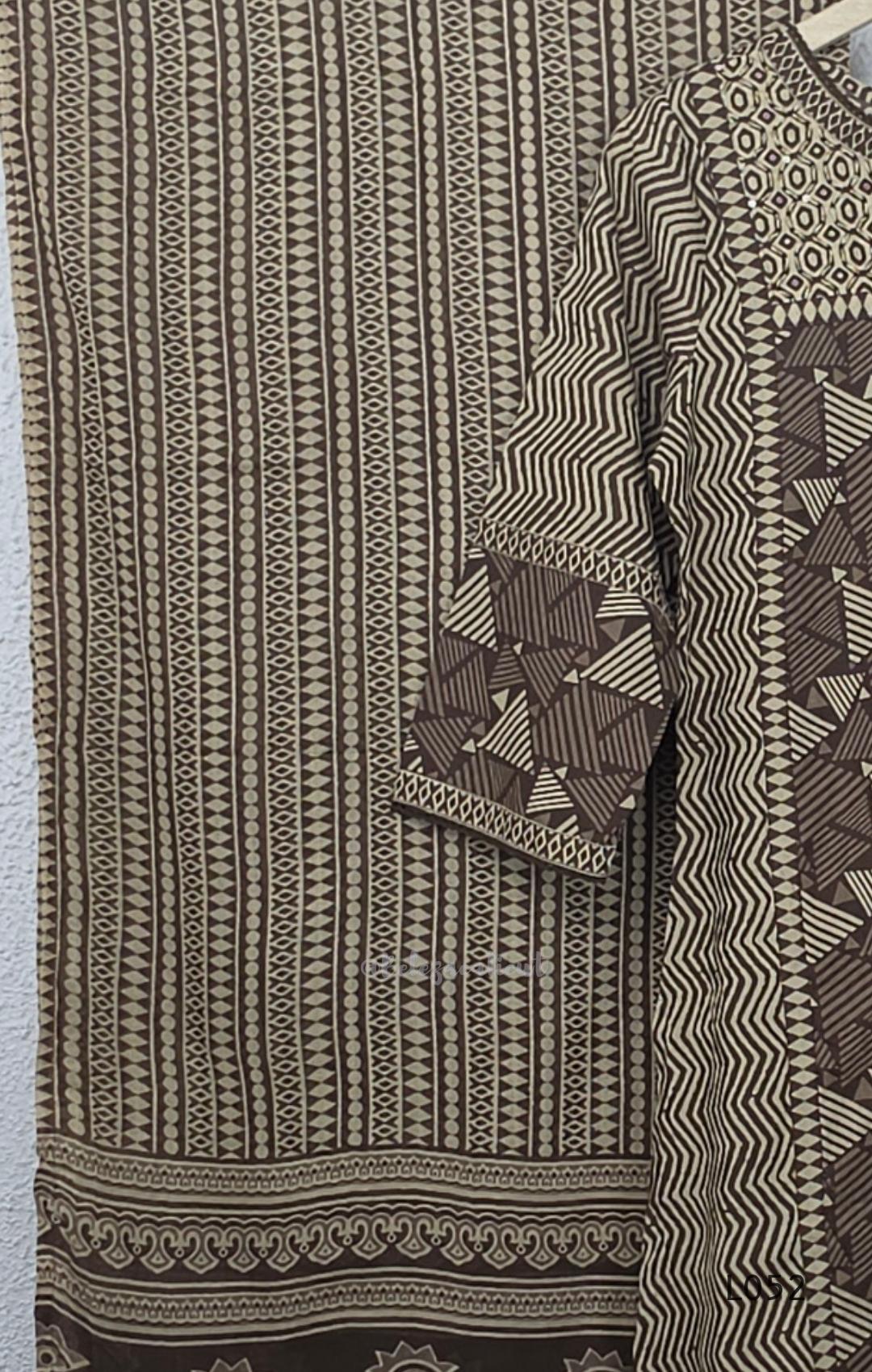 Brown and beige cotton churidar set with geometric block print kurti, matching bottom and printed dupatta at Beleza Calicut.