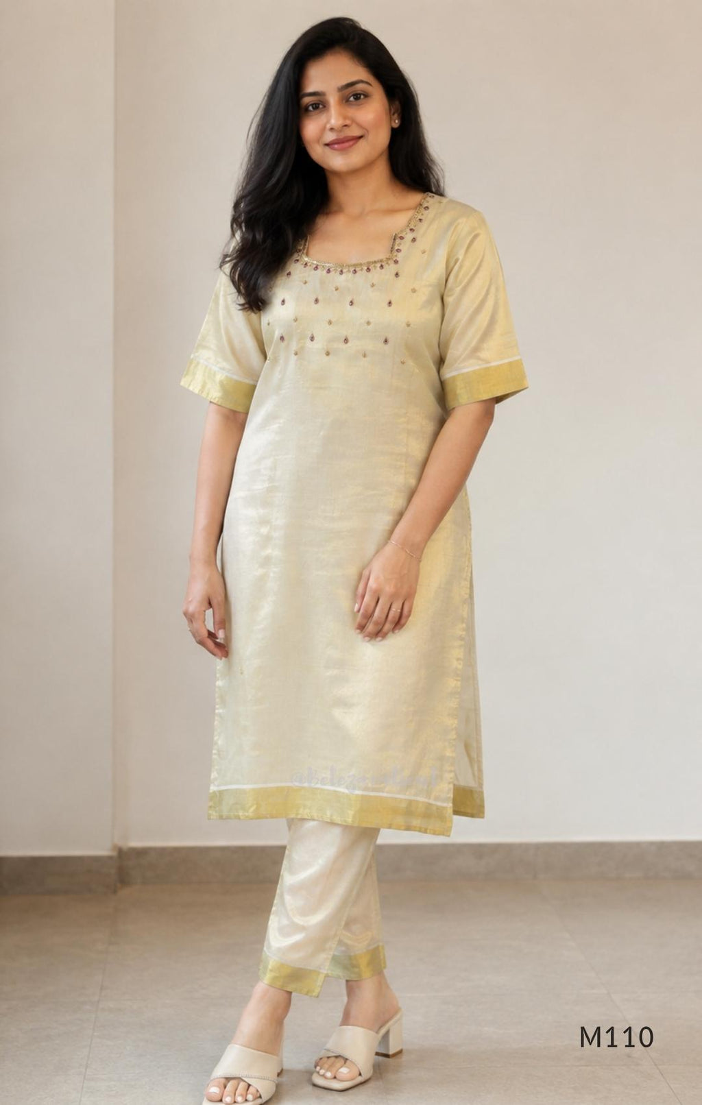 Champagne gold tissue silk 2-piece set with embellished neckline, elbow sleeves, straight kurta and matching bottom.
