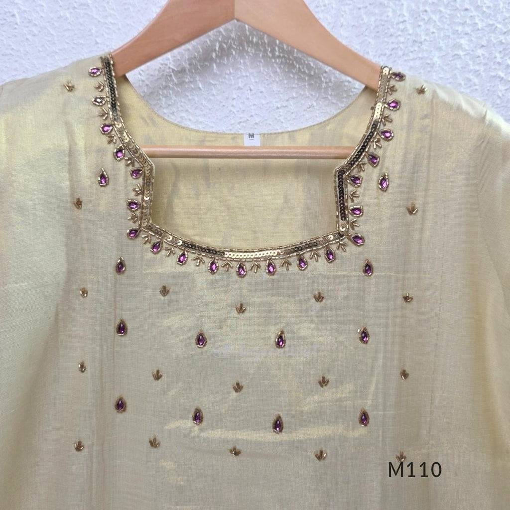 Champagne gold tissue silk 2-piece set with embellished neckline, elbow sleeves, straight kurta and matching bottom.