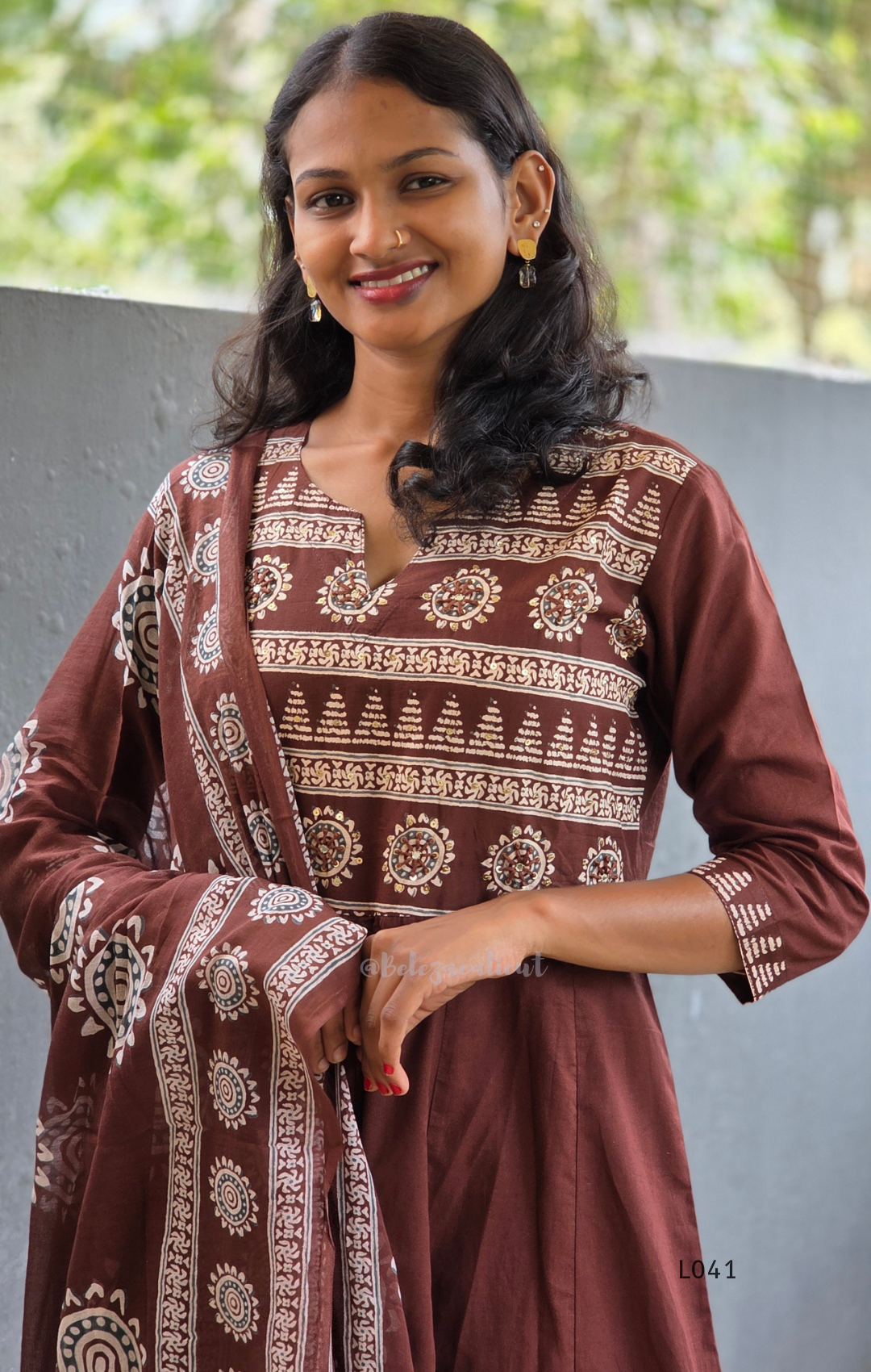 Chocolate brown Jaipur cotton 3-piece churidar set with cream horizontal band block print, mandala circular motifs, V-notch neckline, A-line flared kurti with 3/4 sleeves and border hem, matching block print dupatta, Indian ethnic wear from Beleza Calicut