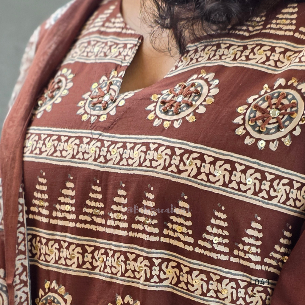 Chocolate brown Jaipur cotton 3-piece churidar set with cream horizontal band block print, mandala circular motifs, V-notch neckline, A-line flared kurti with 3/4 sleeves and border hem, matching block print dupatta, Indian ethnic wear from Beleza Calicut