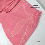 Coral pink rayon blend 2-piece set with white leaf line print, high neck top, back zip and matching printed straight pant.
