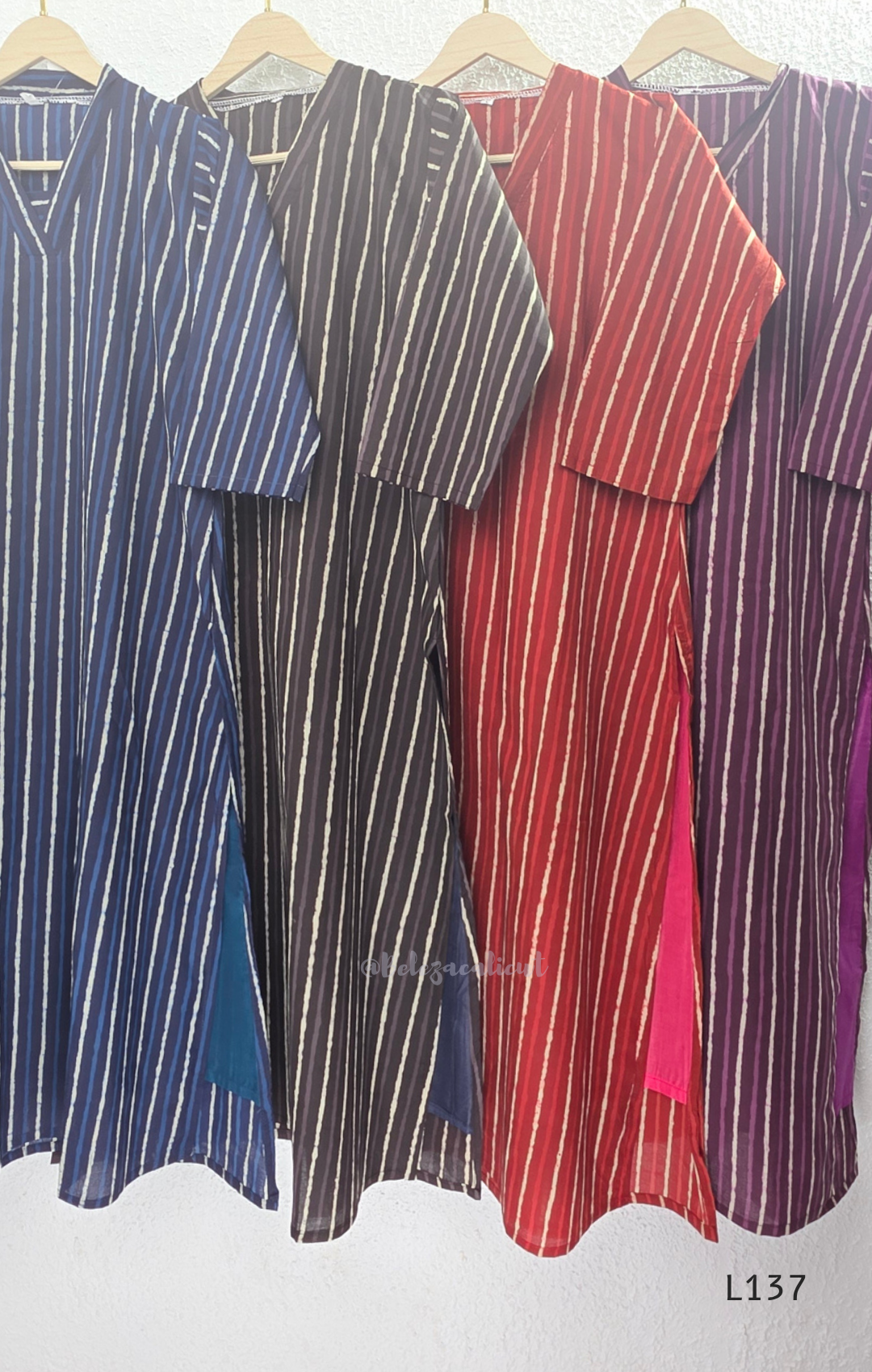 Cotton women’s ethnic top in stripe and floral print patterns with V-neck, straight fit, and everyday kurti-style design.