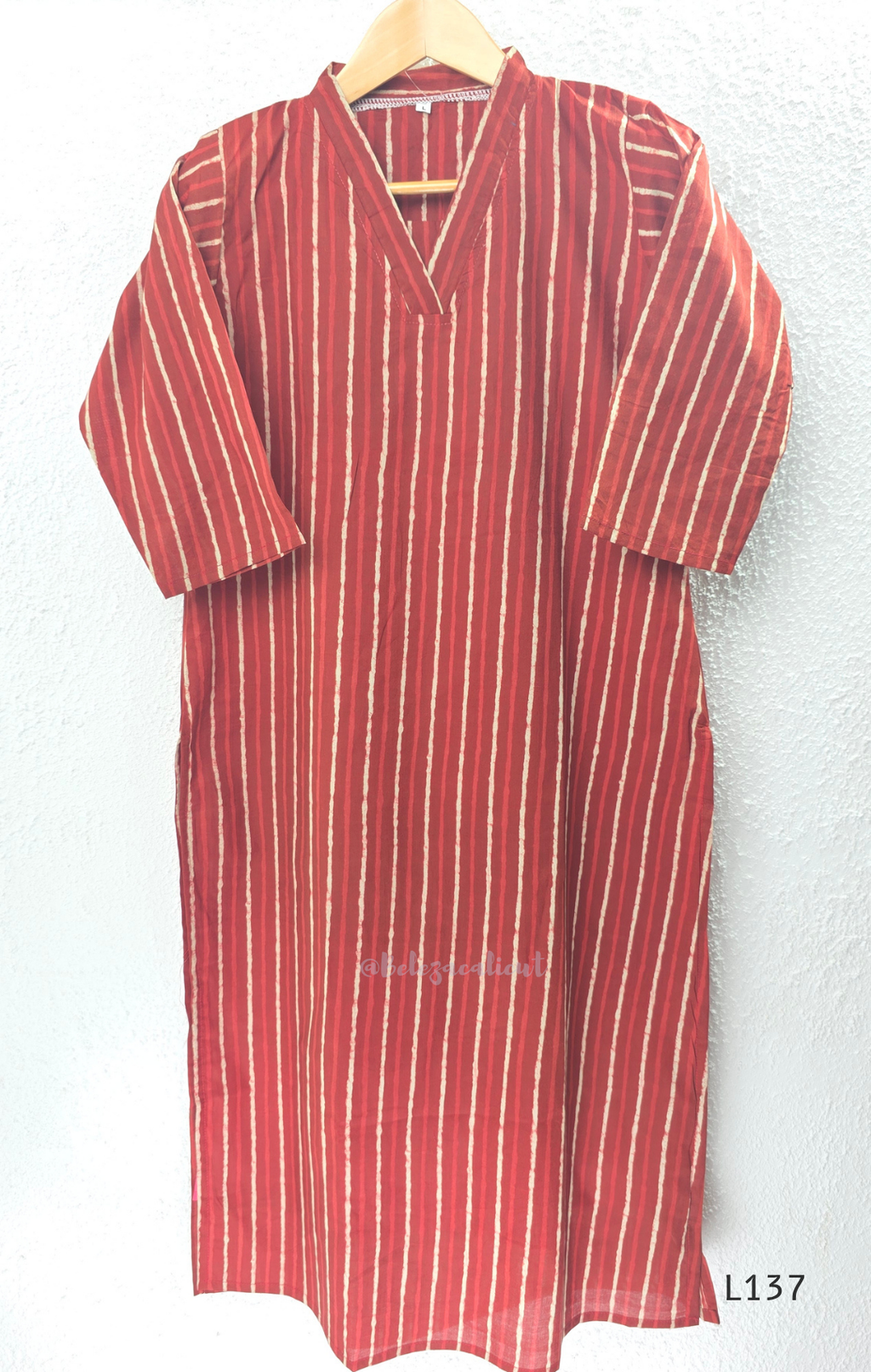 Cotton women’s ethnic top in stripe and floral print patterns with V-neck, straight fit, and everyday kurti-style design.